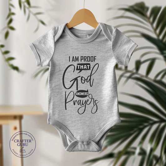 ✨ I Am Proof That God Answers Prayers – Faith-Inspired (Baby Bodysuit)
